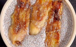 Caramelized banana slices in a speckled ceramic bowl, ready to serve